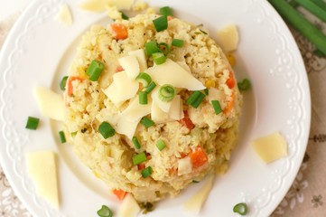 Millets with vegetables, spring onion and cheese