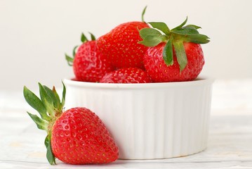 Strawberries on the wooden background