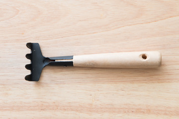 Gardening tools on a wooden board