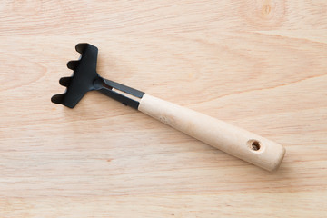 Gardening tools on a wooden board