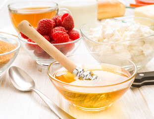 bowl of honey with berries