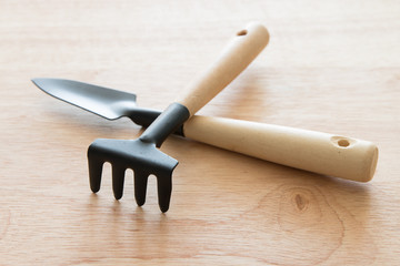 Gardening tools on a wooden board