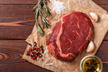 Raw fresh meat Ribeye Steak and seasoning.