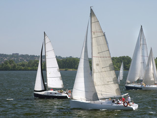 Fototapeta premium sailboats in a race at sunny day
