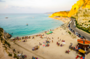 Aerial view of beach in Tropea, Italy. Tilt-shift effect applied