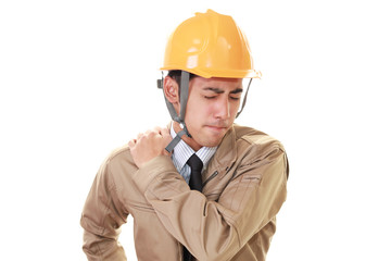 疲れた表情の労働者