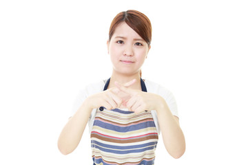 禁止の意思表示をする女性
