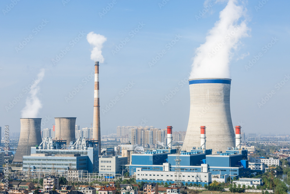 Wall mural industrial power plant smoke pollution in the blue sky