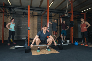 Obraz na płótnie Canvas Cross-Fit Trainers doing various exercises
