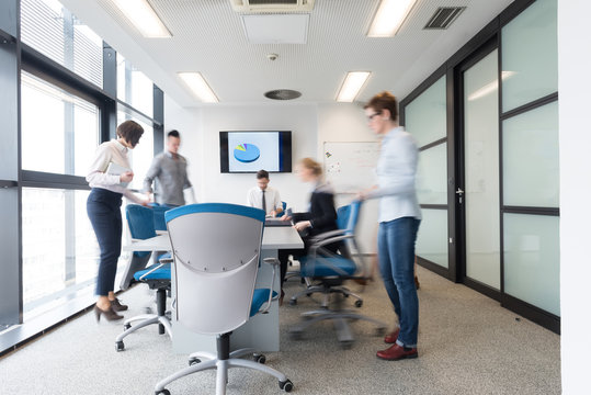 Business People Group Entering Meeting Room, Motion Blur