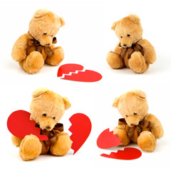 Broken heart teddy bear with red paper heart isolated on white background. Hurts love and lonely sad doll. Front view. Close up.
