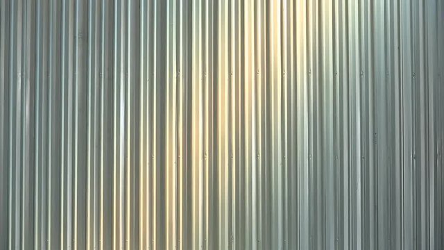 Zoom effect on corrugated metal sheet wall background