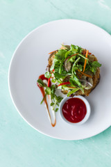 Deep fried chicken with salad and tomato ketchup on white plate