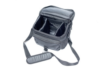 black camera bag on open  white background , select focus Top view