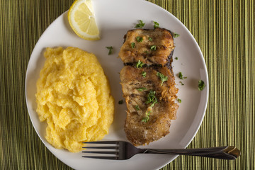 Fried carp with polenta