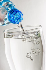 Pouring water from bottle