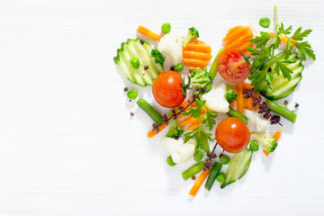 Fresh organic ingredients in the form of heart. Concept of healt