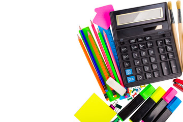 Stationery isolated on white. Notebooks, markers, pencils, rulers, stickers, stapler