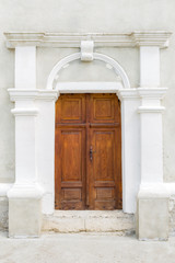 Vertical shot of the entrance door in church