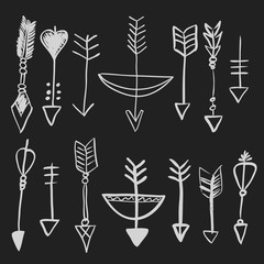 Hand drawn doodle vector arrows set