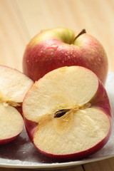 Apple on a white plate