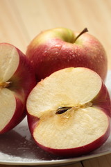 Apple on a white plate