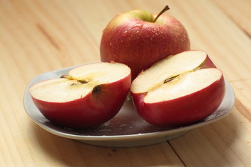 Apple on a white plate