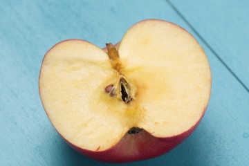 Apple on a white plate