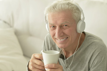 portrait of senior man in headphones