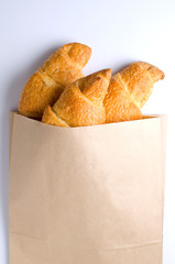 croissants in crafting the package on a white background