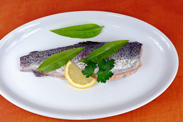 Trout with wild garlic, lovage and lemon