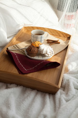 Sweet breakfast in bed with coffee