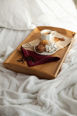 Fototapeta na wymiar Sweet breakfast in bed with coffee