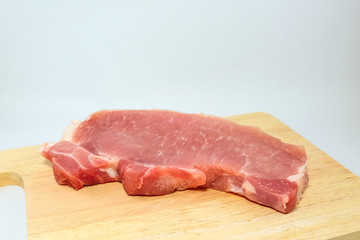 pork steak on the wooden block