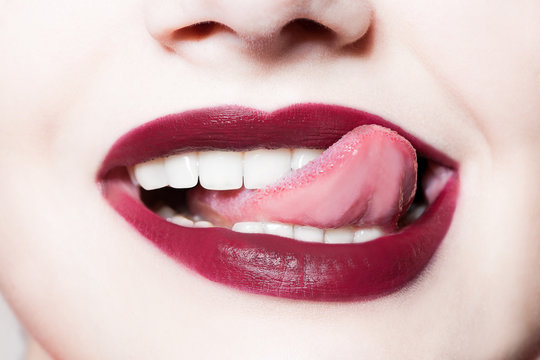 Closeup Portrait Of  Woman's  Dark Red Lips