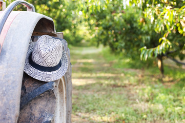 Hat on tractor's wheel