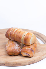Homemade sweet baked rolls buns copy space over white