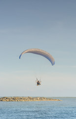 Paramotor on the sky in the evening:Close up,select focus with s