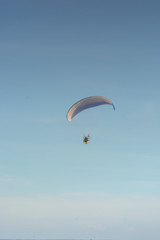 Paramotor on the sky in the evening:Close up,select focus with s