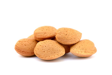 Pile of unpeeled almonds isolated on white background