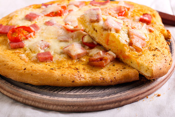 Bacon, herbs and tomato homemade pizza,