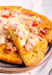 Bacon, herbs and tomato homemade pizza,