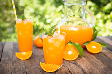Orange juice in the glass with ice