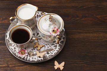 Tea set on the wooden background