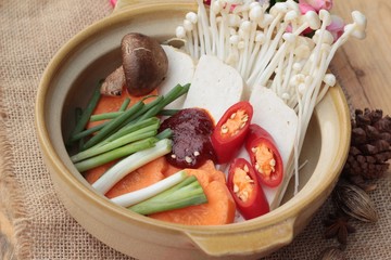 Making Korean tofu soup delicious.