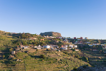 The mountain village Chipude situated In the highlands of La Gomera on the Canary archipelago. In the background the famous mesa La Fortaleza, one of the big landmarks on the Island