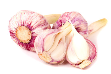 three fresh garlic head isolated on white background