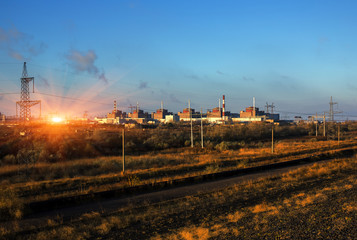 Nuclear energy . Nuclear Power Station at sunset.