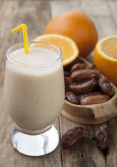 Smoothies of orange and dates .