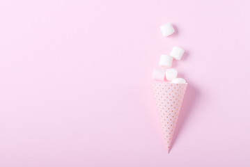 marshmallow on a pink background
